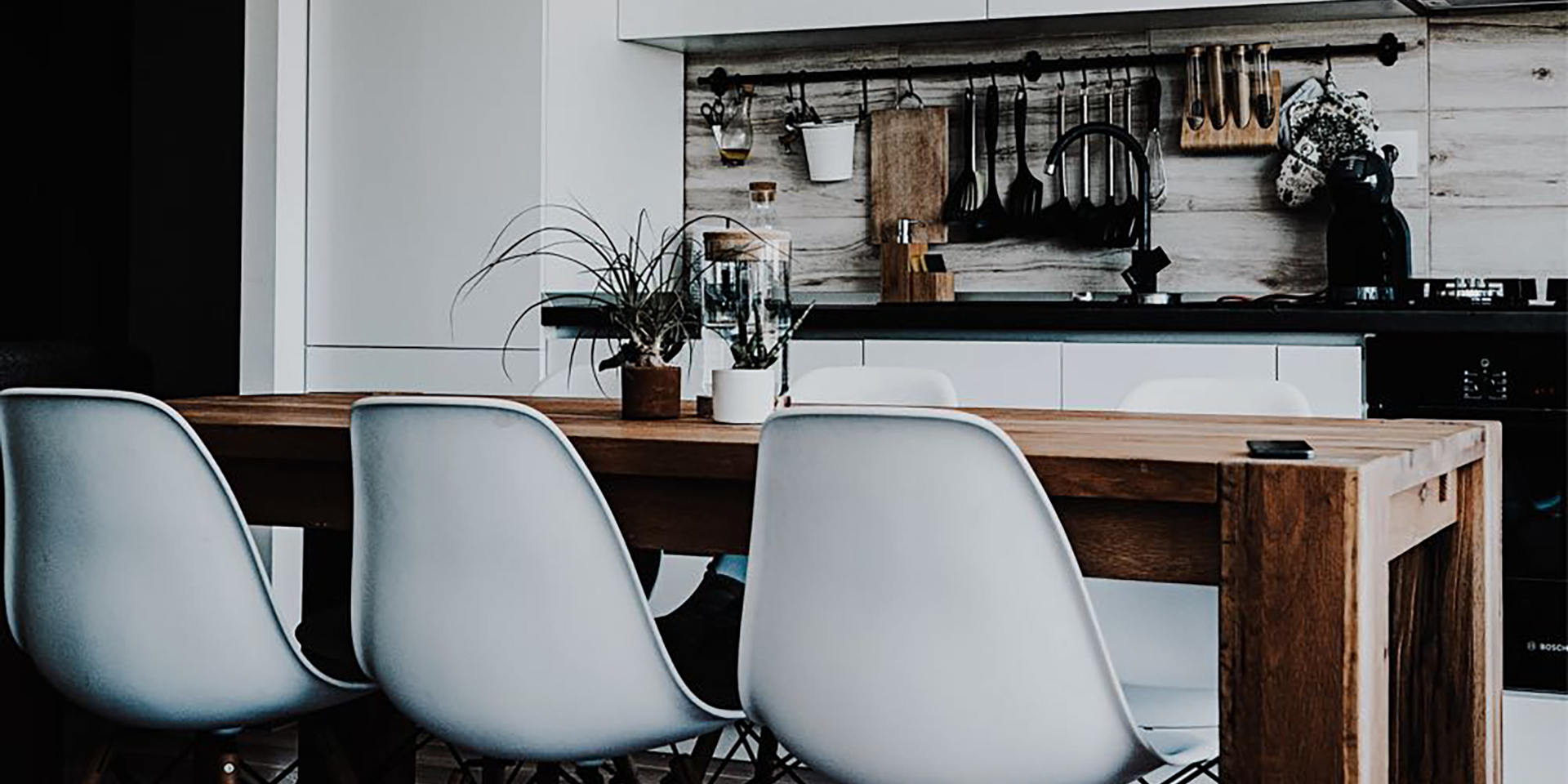 an elegantly-decorated showpiece kitchen workspace and table